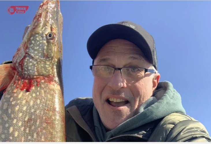 Dan Bernstein holds the northern pike he caught March 13 at Northerly Island.