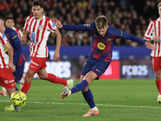 Barcelona's Spanish midfielder Daniel Olmo scores his team's second goal during the Spanish league match between FC Barcelona and Club Atletico de Madrid