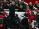 Liverpool’s Swedish striker Alexander Isak passes Liverpool’s Dutch manager Arne Slot as he leaves the pitch after being substituted off during the English Premier League football match between Liverpool and Sunderland at Anfield