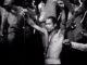 Fela Anikulapo-Kuti performing Afrobeat music on stage in the 1980s