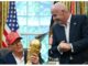 Donald Trump and FIFA President Gianni Infantino posing with the World Cup trophy
